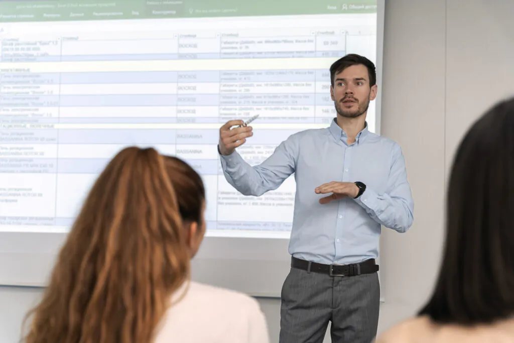 business man holding presentation office her colleagues